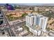 Aerial view of the Platinum Hotel & Spa with its urban surroundings and rooftop pool at 211 E Flamingo Rd # 402, Las Vegas, NV 89169