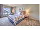 Bright bedroom with Eiffel Tower themed decor, a plush queen bed, and a large view window at 211 E Flamingo Rd # 402, Las Vegas, NV 89169