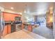 Kitchen with stainless steel appliances, cabinets, a breakfast bar, that opens to a living room at 211 E Flamingo Rd # 402, Las Vegas, NV 89169