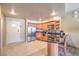 Kitchen area featuring stainless steel appliances, breakfast bar and tile floor at 211 E Flamingo Rd # 402, Las Vegas, NV 89169