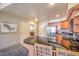 Kitchen area with stainless steel appliances, breakfast bar, and tile floors at 211 E Flamingo Rd # 402, Las Vegas, NV 89169