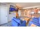 Living room with a kitchen and doors to the bedroom and bathroom at 211 E Flamingo Rd # 402, Las Vegas, NV 89169