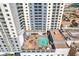 Outdoor rooftop pool and lounge area with views of the city from the Platinum Hotel & Spa at 211 E Flamingo Rd # 402, Las Vegas, NV 89169