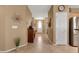 Inviting entryway features tiled floors, decorative accents, and ample space, seamlessly connecting to the rest of the home at 2166 Alyssa Jade Dr, Henderson, NV 89052