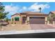 Charming single-story home featuring a gated front entrance and a two car garage at 2166 Alyssa Jade Dr, Henderson, NV 89052