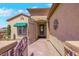Front exterior featuring a gated courtyard with brick pavers and seating at 2166 Alyssa Jade Dr, Henderson, NV 89052