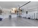 Spacious garage featuring epoxy flooring, utility sink, work bench and extra storage capacity at 2166 Alyssa Jade Dr, Henderson, NV 89052
