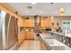 Beautiful kitchen with stainless steel appliances, granite countertops, tile backsplash and eat in dining area at 2166 Alyssa Jade Dr, Henderson, NV 89052