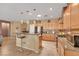 Kitchen featuring stainless appliances, breakfast bar with pendant lights, and view of dining area at 2166 Alyssa Jade Dr, Henderson, NV 89052