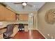 Spacious office area with built-in cabinets, ceiling fan, and hardwood floors at 2166 Alyssa Jade Dr, Henderson, NV 89052