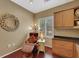 Inviting home office with built-in shelves, comfortable seating and warm lighting at 2166 Alyssa Jade Dr, Henderson, NV 89052