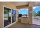 Cozy outdoor kitchen with built-in grill and counter space perfect for entertaining guests at 2166 Alyssa Jade Dr, Henderson, NV 89052