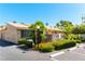 Charming exterior view of the home featuring manicured landscaping and ample parking space at 2241 Tall Pine Dr, Las Vegas, NV 89108