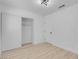 Bright bedroom with neutral walls, modern flooring, closet and a modern ceiling fan at 2832 Sing Song Way, Las Vegas, NV 89106
