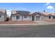 Charming single-story home featuring desert landscaping and solar panels for energy efficiency at 2832 Sing Song Way, Las Vegas, NV 89106
