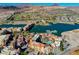 Beautiful aerial shot showcasing the community's waterfront location, golf course and surrounding mountains at 30 Strada Di Villaggio # 227, Henderson, NV 89011