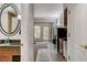 Cozy studio featuring bathroom, living area, kitchenette, and balcony access at 30 Strada Di Villaggio # 227, Henderson, NV 89011