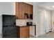 Functional kitchenette includes a small sink, mini-fridge, and counter space; a practical solution at 30 Strada Di Villaggio # 227, Henderson, NV 89011