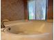 Jetted bathtub with a view at 3142 Bel Air Dr, Las Vegas, NV 89109