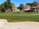 Scenic view of the lush golf course and nearby homes, offering a tranquil community atmosphere at 3142 Bel Air Dr, Las Vegas, NV 89109