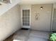 A well-maintained front entrance with visible unit numbers and concrete pathway at 3150 Soft Breezes Dr # 1192, Las Vegas, NV 89128