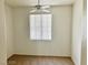 Neutral bedroom features carpet, a ceiling fan, and a window with vertical blinds at 338 Brilliant Summit Cir, Henderson, NV 89052