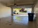 Open garage showcasing neighborhood views, offering space and natural light at 338 Brilliant Summit Cir, Henderson, NV 89052