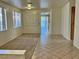 Open-concept living space featuring tile floors and lots of natural light at 338 Brilliant Summit Cir, Henderson, NV 89052