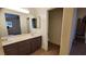 Bathroom with double sinks, ample counter space, and a separate toilet room at 37 Belle Soleil Ave, Las Vegas, NV 89123