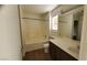 Bright bathroom featuring a bathtub, shower, and vanity with modern fixtures at 37 Belle Soleil Ave, Las Vegas, NV 89123