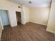 Spacious bedroom with natural light, featuring wood flooring at 37 Belle Soleil Ave, Las Vegas, NV 89123