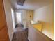 Hallway with wood flooring overlooking a room with natural light at 37 Belle Soleil Ave, Las Vegas, NV 89123