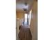 Hallway with wood flooring leading to multiple rooms at 37 Belle Soleil Ave, Las Vegas, NV 89123