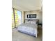 This bedroom offers natural light and city views with a comfortable king bed at 3722 Las Vegas Blvd # 3209, Las Vegas, NV 89158