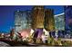 Night view of illuminated city buildings. Includes shopping center and roads with cars at 3722 Las Vegas Blvd # 3209, Las Vegas, NV 89158