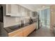 A modern kitchen featuring stainless steel appliances, sleek cabinetry, and countertops, all with amazing city views at 3722 Las Vegas Blvd # 3209, Las Vegas, NV 89158