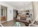 Open-concept living area with modern kitchen, comfortable seating, and views into the stylish bathroom at 3722 Las Vegas Blvd # 3209, Las Vegas, NV 89158