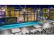 Stunning rooftop pool at night with city lights, lounge areas, and luxurious amenities at 3722 Las Vegas Blvd # 3209, Las Vegas, NV 89158