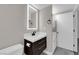 Stylish bathroom with modern vanity and in-unit laundry at 3944 Visby Ln, Las Vegas, NV 89119