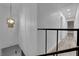Bright hallway featuring updated lighting and wood-look flooring at 3944 Visby Ln, Las Vegas, NV 89119