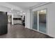 Open-concept kitchen and dining area with sliding glass doors to the patio at 3944 Visby Ln, Las Vegas, NV 89119