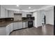 View of kitchen with stainless steel appliances and hardwood floors at 3944 Visby Ln, Las Vegas, NV 89119