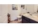 Powder room featuring a single sink vanity and neutral wall decor at 412 Middlestone Ave, Henderson, NV 89011