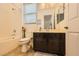Bathroom featuring a tub, shower, toilet, and vanity at 412 Middlestone Ave, Henderson, NV 89011