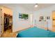 Bedroom with a ceiling fan, dresser, walk-in closet, and coastal themed decor at 412 Middlestone Ave, Henderson, NV 89011