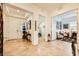 Elegant foyer with tile flooring, a decorative table, and an open view into adjoining living spaces at 412 Middlestone Ave, Henderson, NV 89011