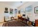 Bright home office with patterned chairs, an area rug, and a vintage desk at 412 Middlestone Ave, Henderson, NV 89011