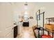 Bright laundry room with machines, storage, and natural light from a window at 412 Middlestone Ave, Henderson, NV 89011