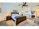 Comfortable primary bedroom with a bed, dressers, and natural lighting at 412 Middlestone Ave, Henderson, NV 89011