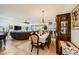 Spacious open floor plan featuring the dining area, kitchen, and living room, perfect for entertaining at 412 Middlestone Ave, Henderson, NV 89011